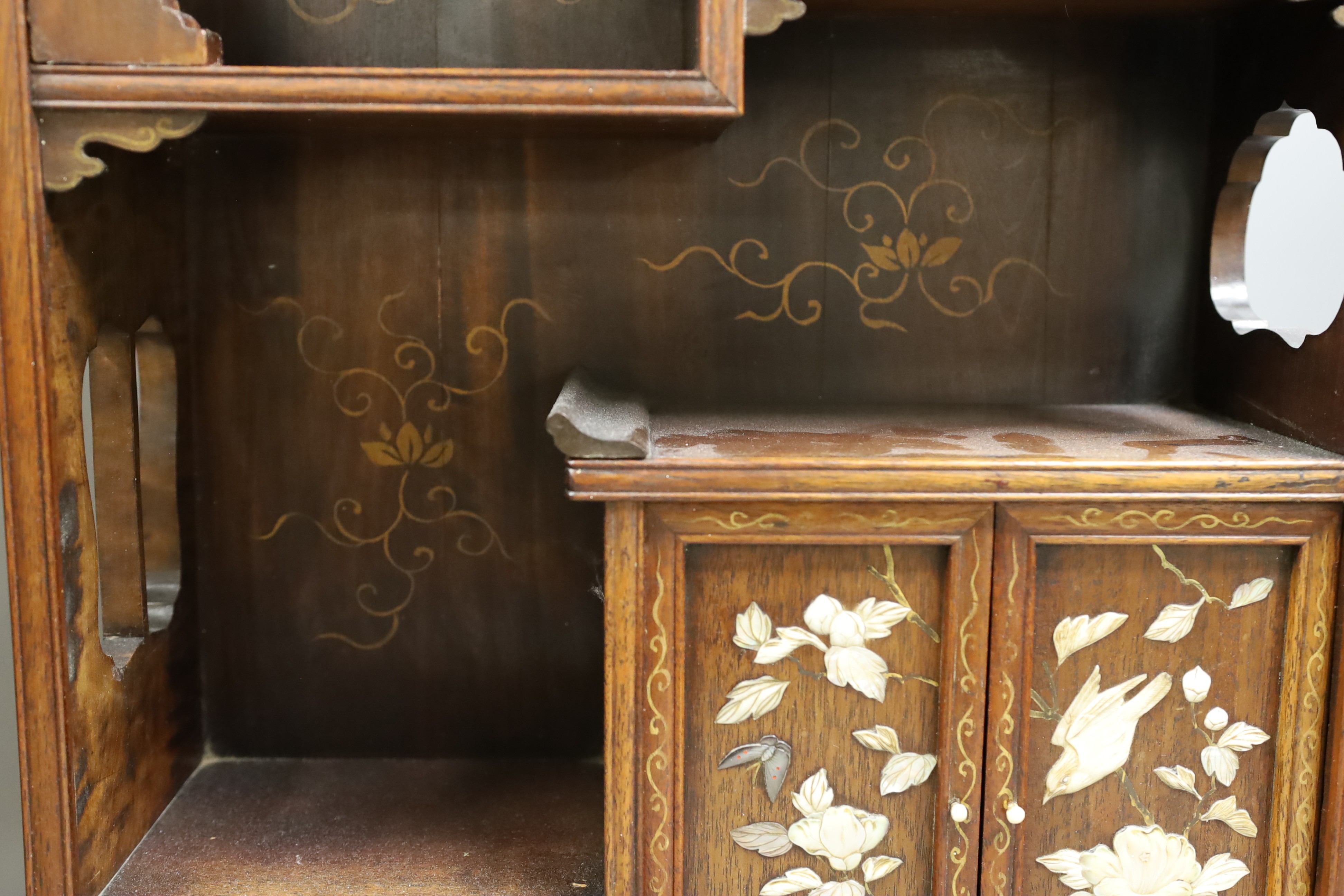 A Japanese hardwood and Shibayma decorated table cabinet, Meiji period, 56cm